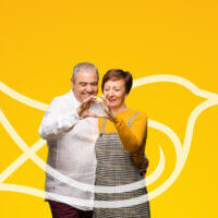 close up portrait of african daughter and senior father on white background